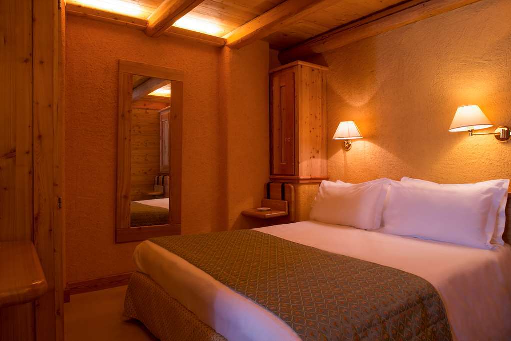 Eco Wellness Hotel Notre Maison Cogne Quarto foto